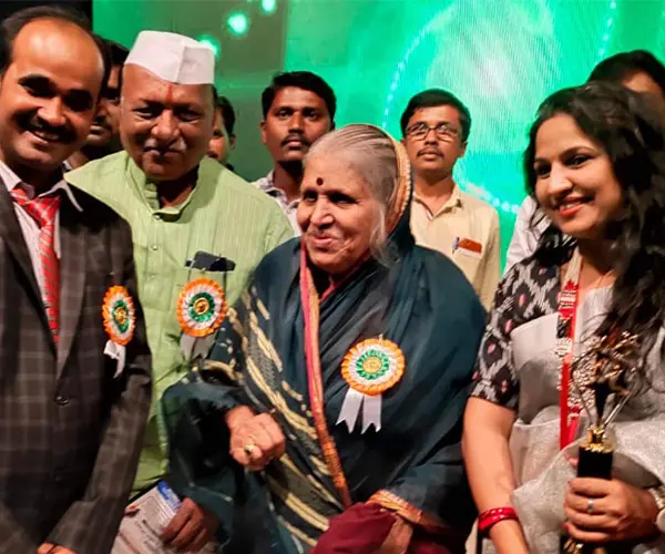 Honourees and organisers at an awards event
